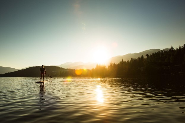 Paddle Boarder Enjoying the Sunset