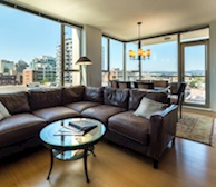 Living room dining room fully furnished apartment suite 702 Victoria