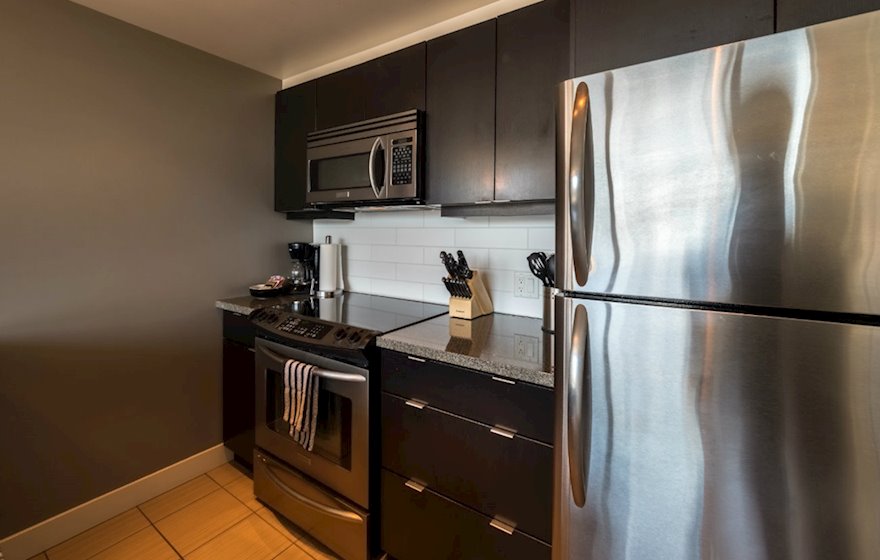 Kitchen Fully Equipped Five Appliances Stainless Steel suite 702 Victoria