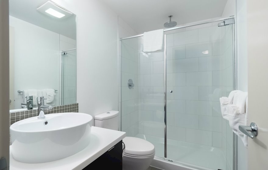 Bathroom walk in shower fully furnished apartment suite 702 Victoria