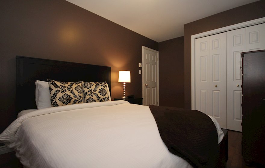 Master Bedroom Queen Mattress Fully Furnished Apartment Suite LeMarchant Town House St. John's, NL
