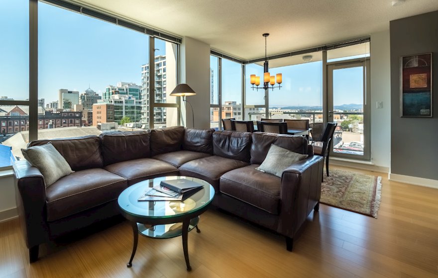 Living room dining room fully furnished apartment suite 702 Victoria