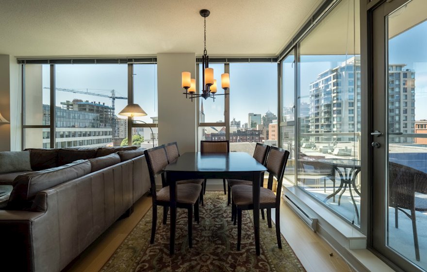 Dining room with a view fully furnished apartment suite 702 Victoria