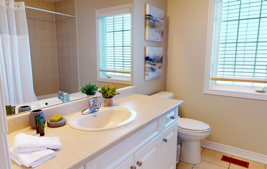 Principal Bathroom Soaker Tub Fully Furnished Apartment Suite Burlington