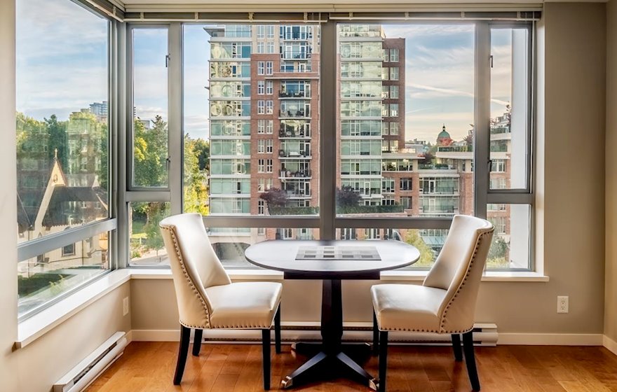 Bistro table with 4th floor apartment suite view of Victoria, Astoria 408